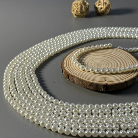 Перли на нитці 8 мм 1 кг, молочний