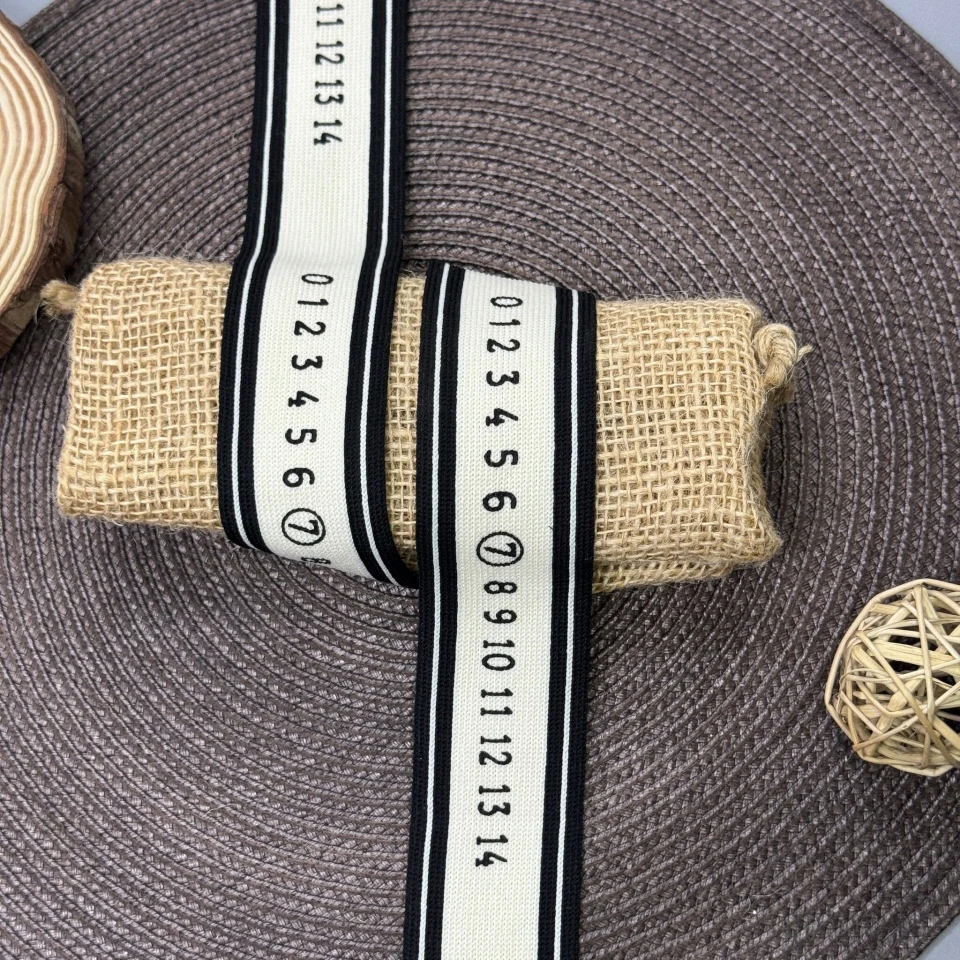 Лампас трикотажний D#5-2 цифри 0-14 4 см (50 м) , молочний