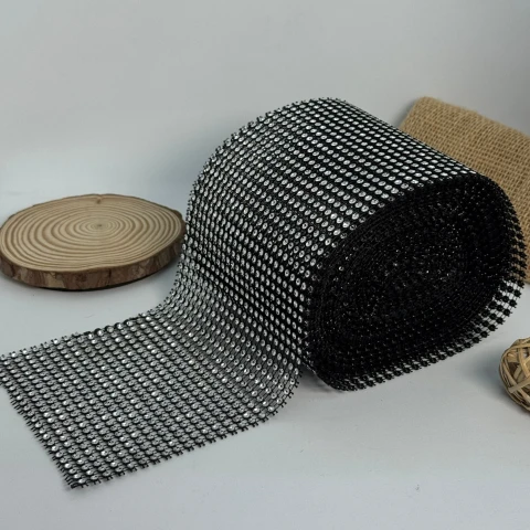 Тасьма пластикова імітація 24 ряда 12 см (10 ярдів/9,14 м.), чорний + срібло