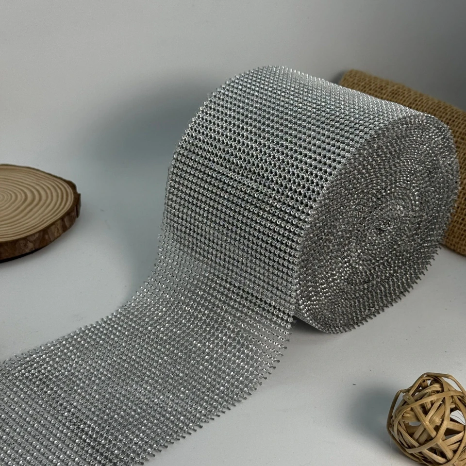 Тасьма пластикова імітація 32 ряда 10 см (10 ярдів/9,14 м.), срібло